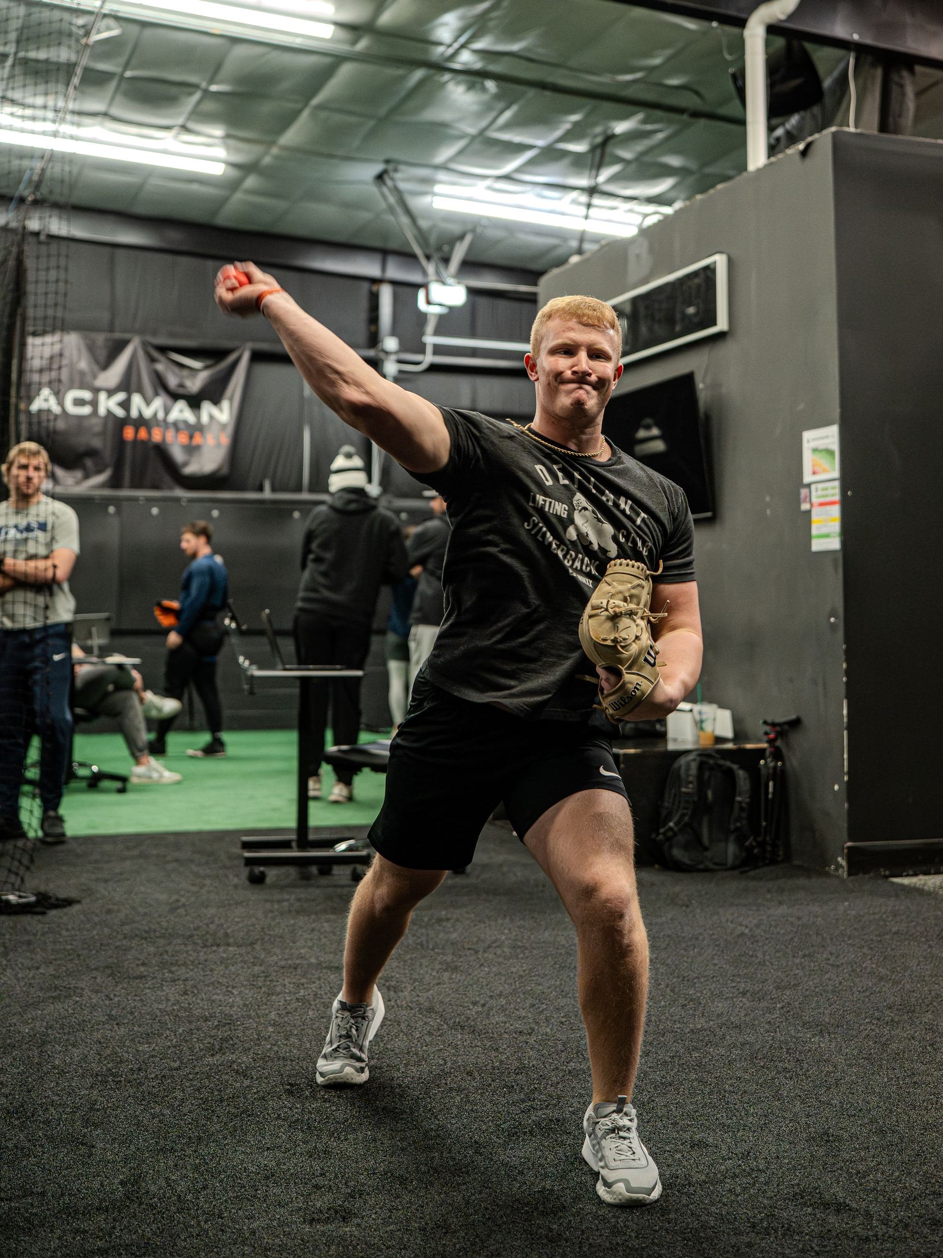 A PPL athlete finishing a plyo ball throw during velocity work