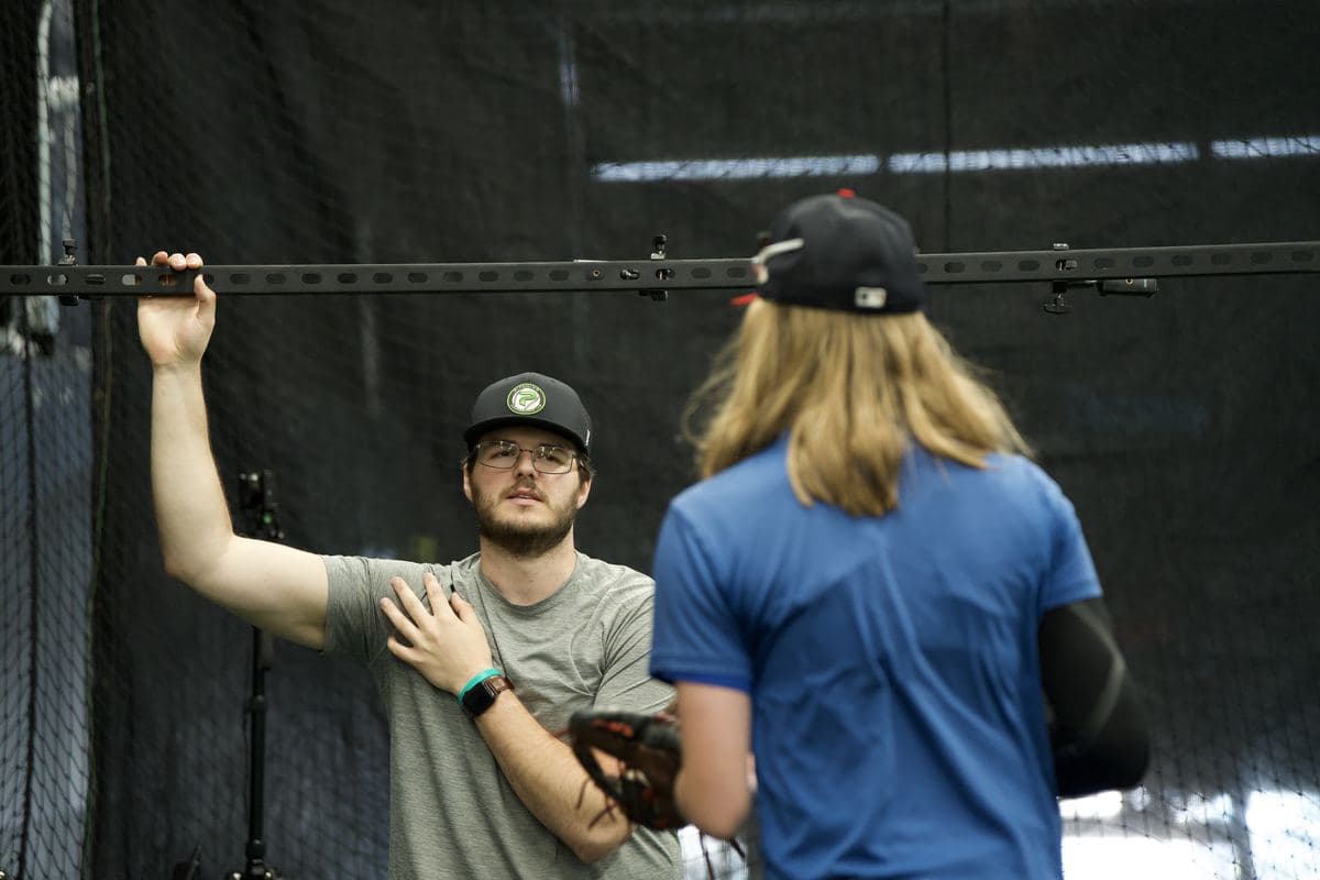 A PPL coach talking with an athlete